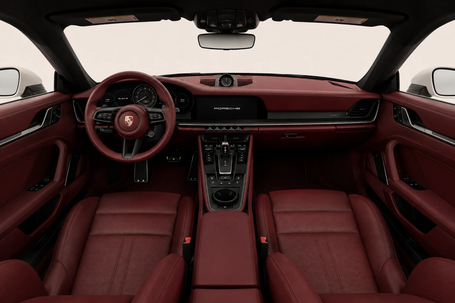 Bordeaux red leather interior of the 911 with the driver-oriented dashboard