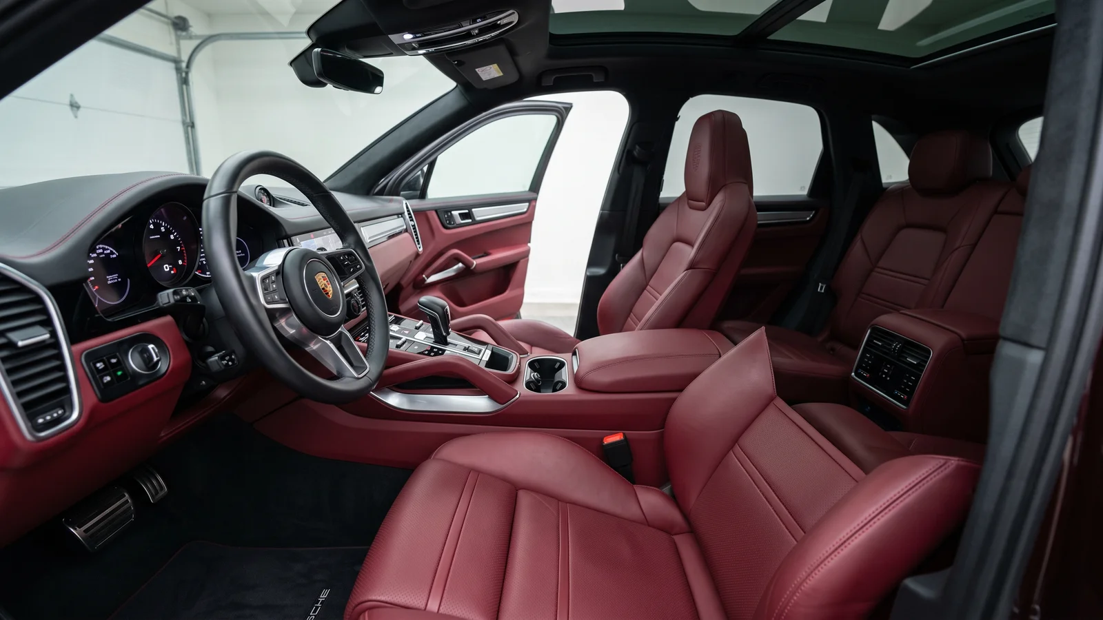 Deep burgundy interior of the Cayenne