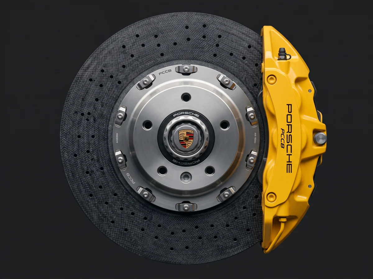 Close-up of a ceramic composite brake disc and caliper